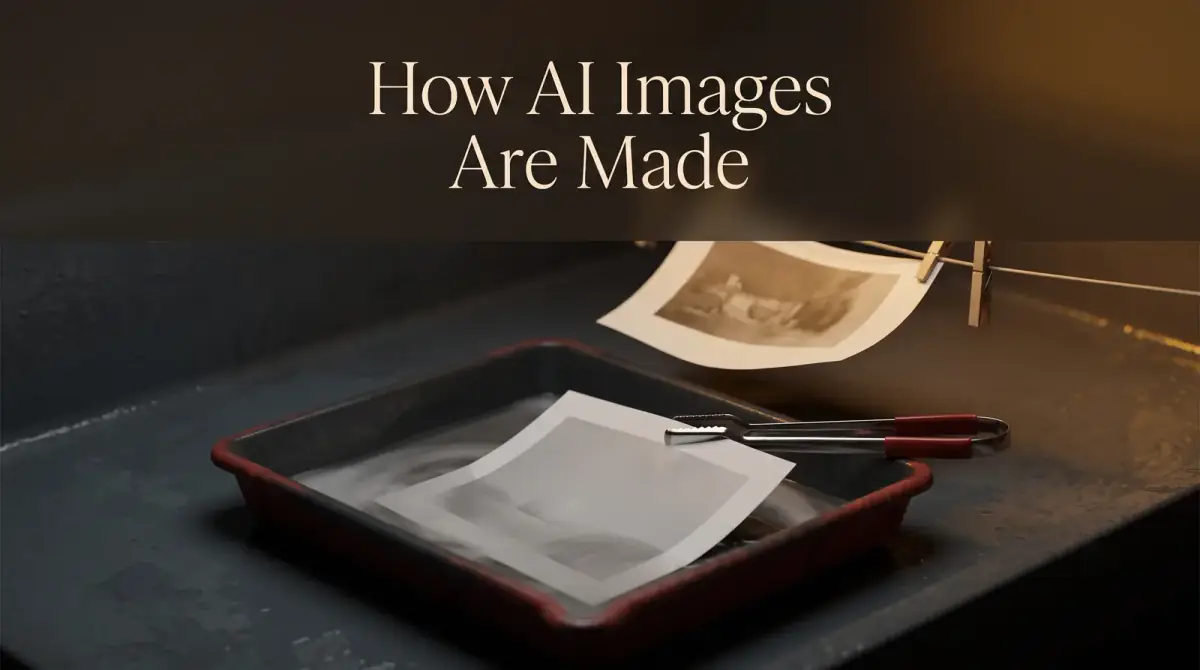a darkroom developing tray with a photo print and tongs