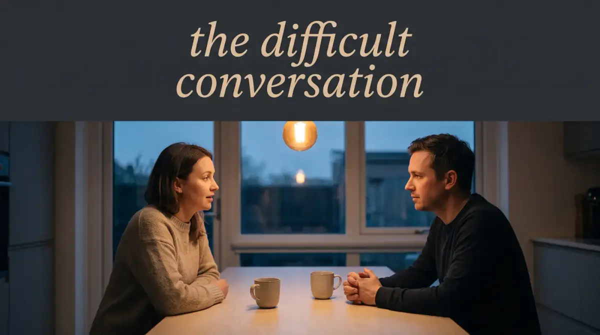 a man and woman facing each other across a kitchen table